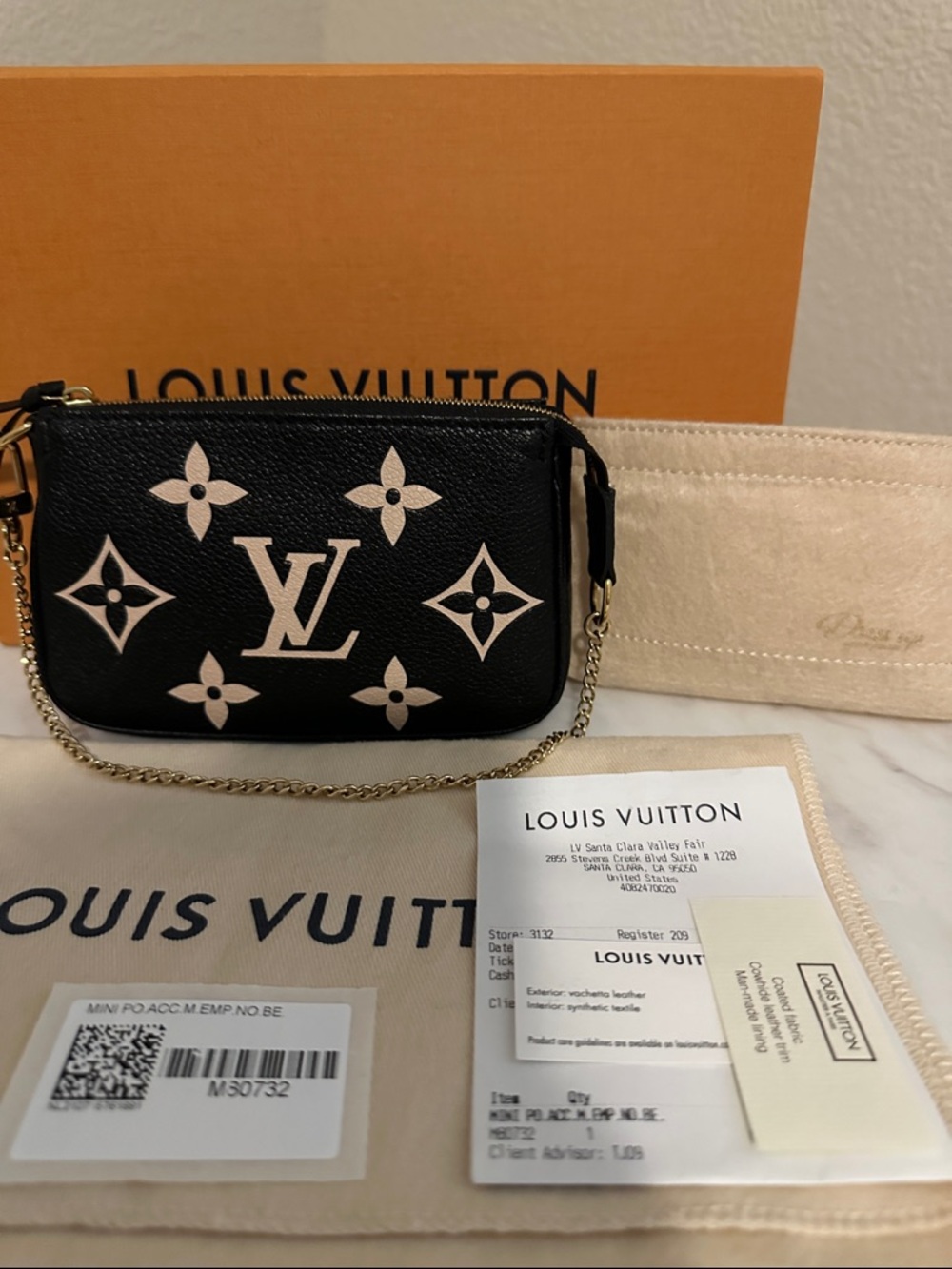 Louis Vuitton Black with Cream Monogram Mini Pochette Wristlet